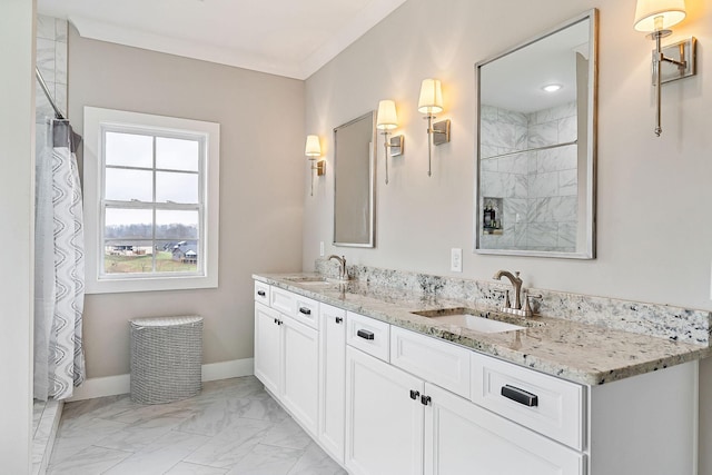 bathroom with vanity and ornamental molding