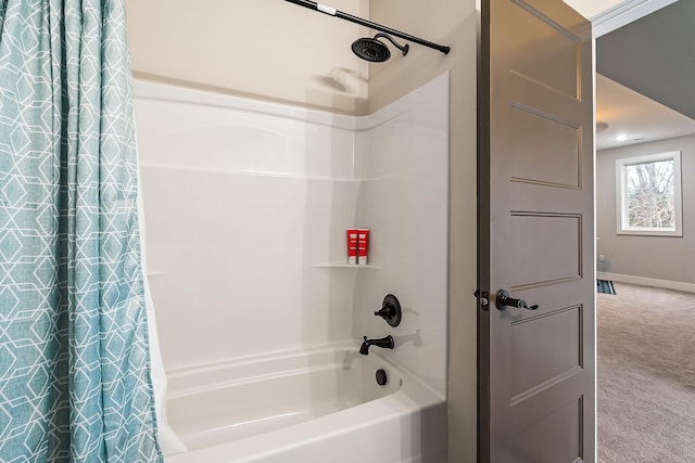 bathroom featuring shower / tub combo with curtain