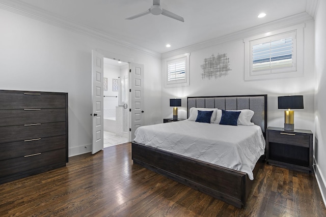 bedroom featuring ceiling fan, dark wood-type flooring, crown molding, and ensuite bath