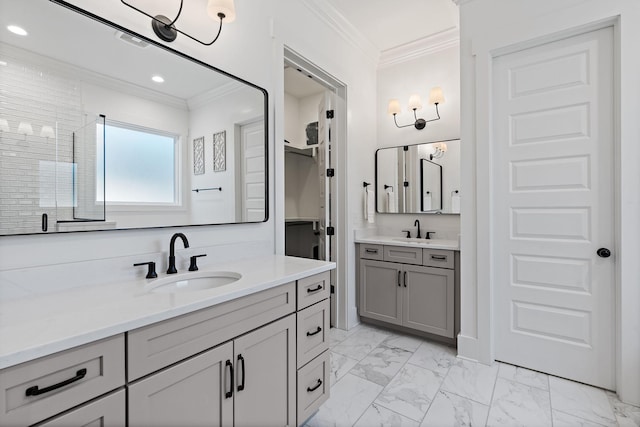 bathroom with vanity and crown molding