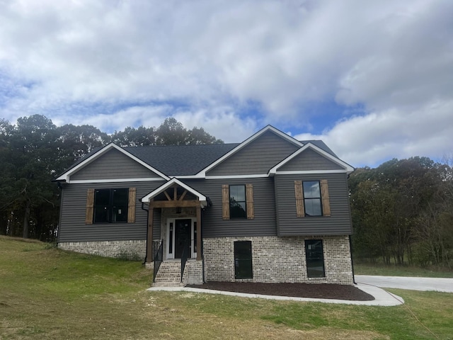 view of front of home with a front lawn