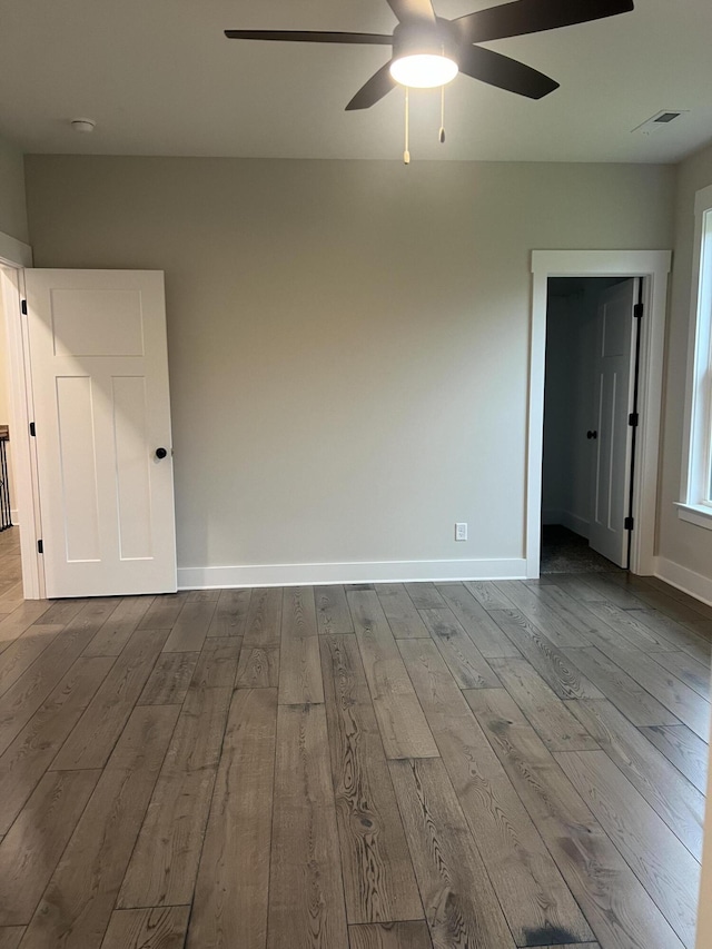 spare room with ceiling fan and light hardwood / wood-style flooring