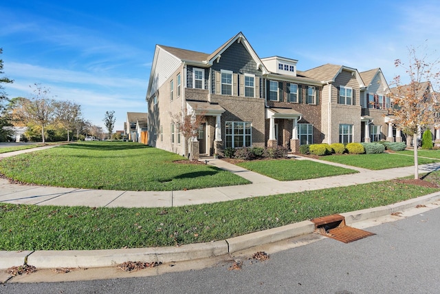 view of front of home featuring a front yard