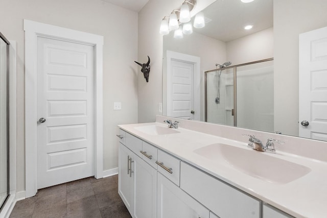 bathroom with vanity and an enclosed shower