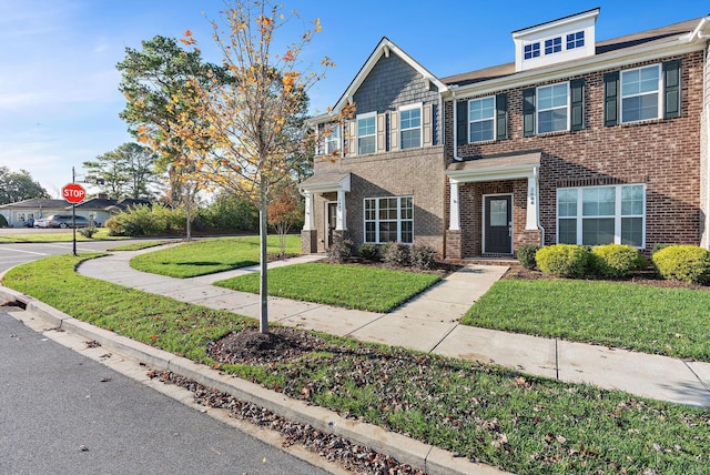 view of front facade with a front yard