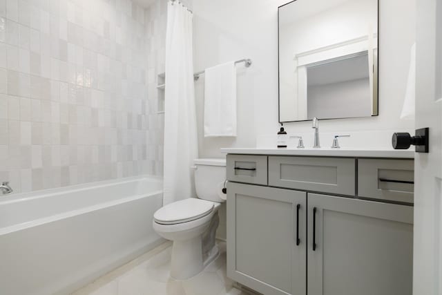 full bathroom with shower / tub combo, vanity, tile patterned flooring, and toilet