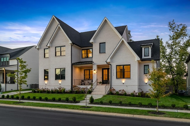 view of front of home featuring a front lawn