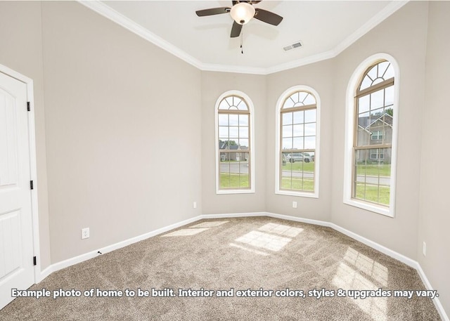 carpeted spare room with crown molding and ceiling fan