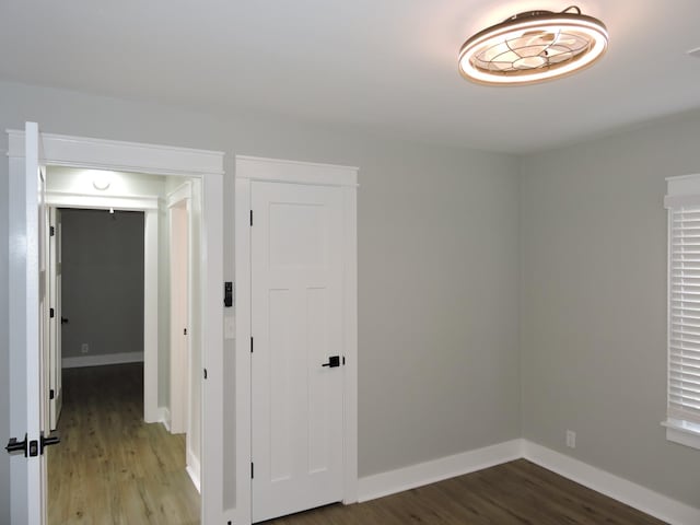 empty room with hardwood / wood-style floors