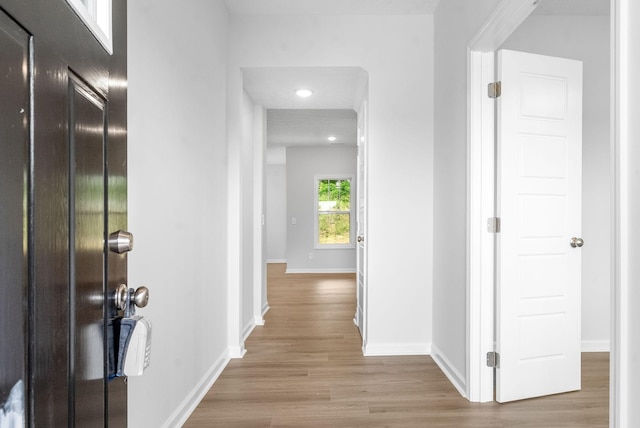 corridor featuring light wood-type flooring