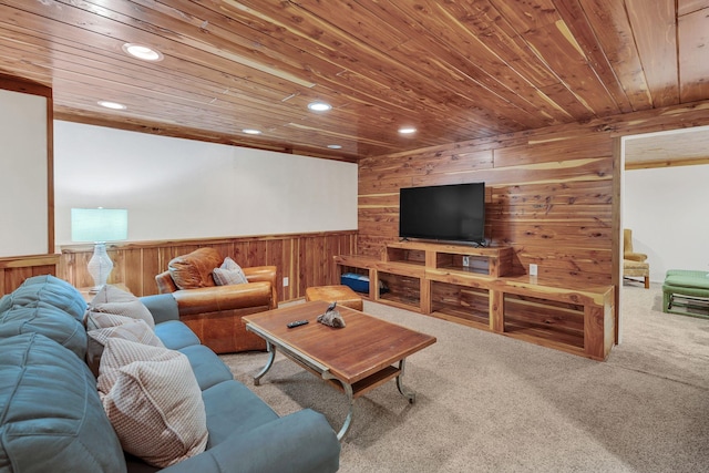 carpeted living room featuring wooden walls and wood ceiling