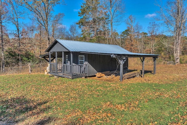 view of outdoor structure with a yard