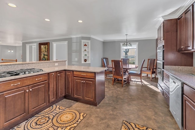 kitchen with kitchen peninsula, light stone countertops, stainless steel appliances, an inviting chandelier, and hanging light fixtures