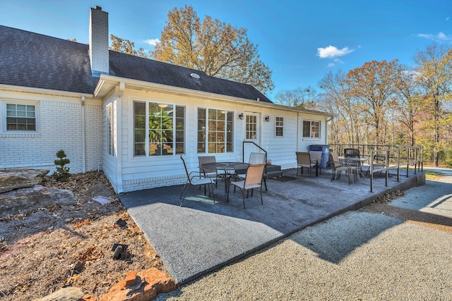 back of property with a patio area