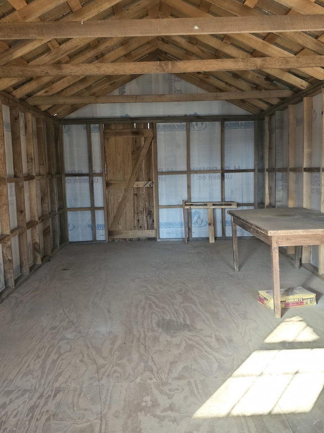 misc room featuring lofted ceiling