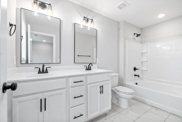 full bathroom featuring vanity, toilet, and washtub / shower combination