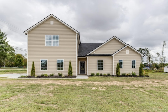 view of front of property with a front lawn