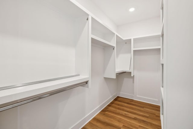 walk in closet featuring hardwood / wood-style floors