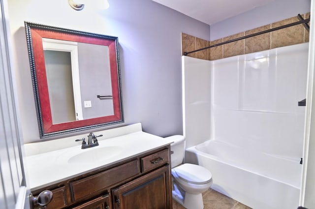 full bathroom featuring tile patterned flooring, vanity, toilet, and shower / washtub combination