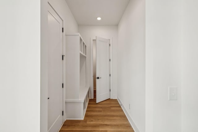 hall with light wood-type flooring