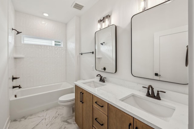 full bathroom with vanity, toilet, and bathing tub / shower combination