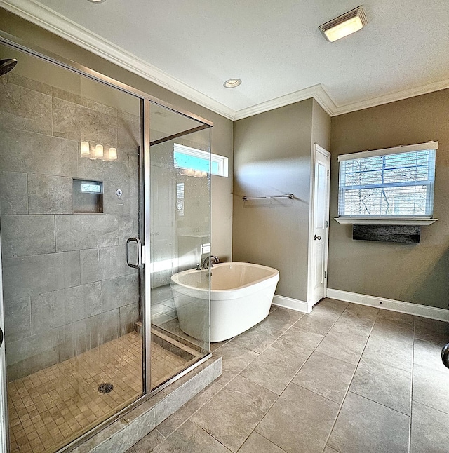 bathroom with tile patterned floors, separate shower and tub, and ornamental molding