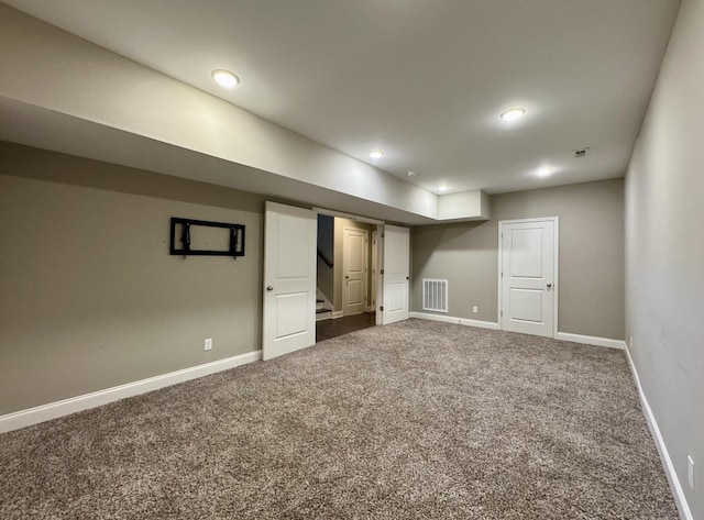 basement with carpet flooring