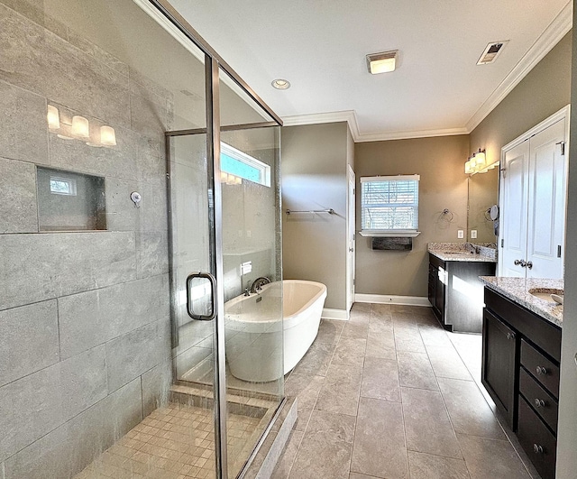 bathroom with tile patterned flooring, vanity, ornamental molding, and shower with separate bathtub