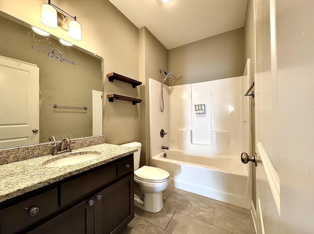 full bathroom with washtub / shower combination, vanity, tile patterned flooring, and toilet