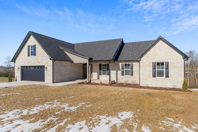 view of front of home with a garage