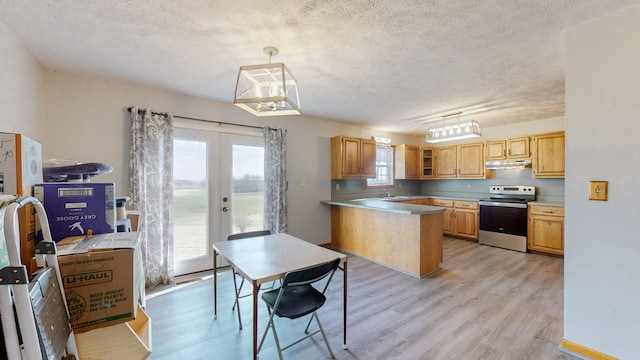 kitchen with french doors, sink, hanging light fixtures, stainless steel electric range oven, and kitchen peninsula