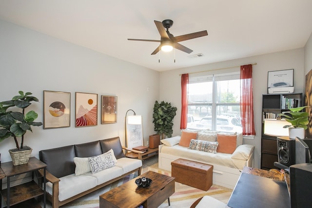 living room featuring ceiling fan