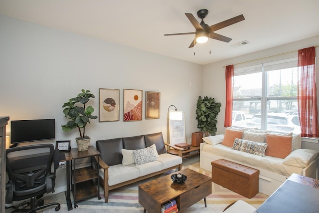 living room with ceiling fan