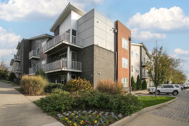 view of property featuring central AC unit