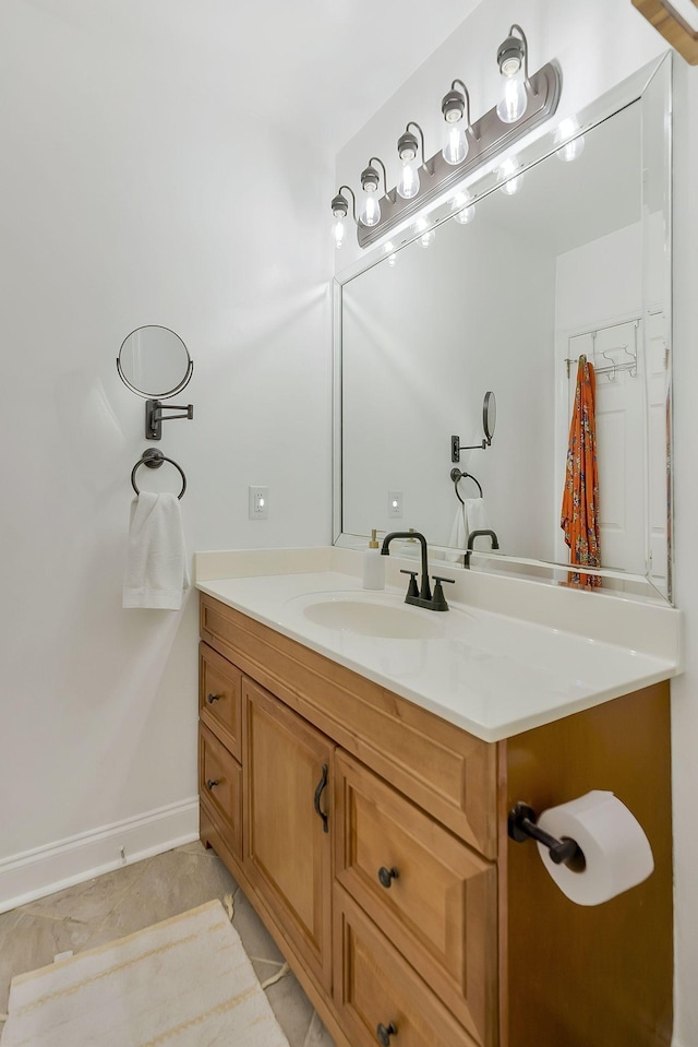 bathroom with vanity and tile patterned floors