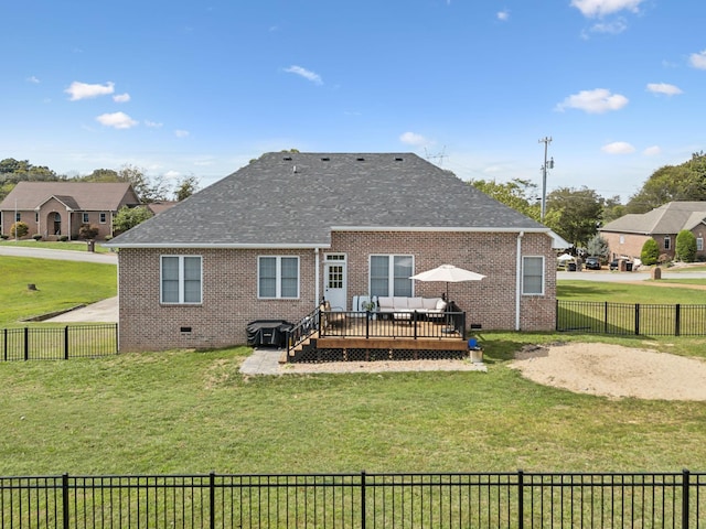 back of property with a wooden deck, an outdoor living space, and a lawn