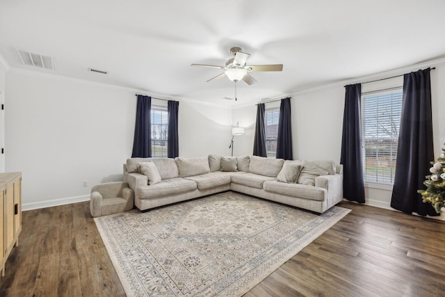 living room featuring ornamental molding, ceiling fan, and dark hardwood / wood-style flooring