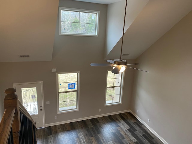 entryway featuring dark hardwood / wood-style floors, a healthy amount of sunlight, and ceiling fan