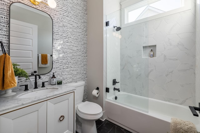 full bathroom with vanity,  shower combination, and toilet