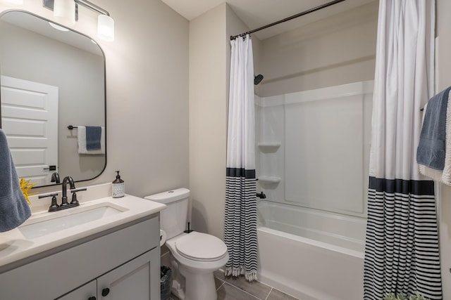 full bathroom featuring shower / tub combo, vanity, and toilet