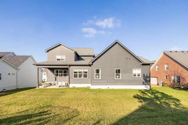 rear view of property with a patio, central AC unit, and a lawn