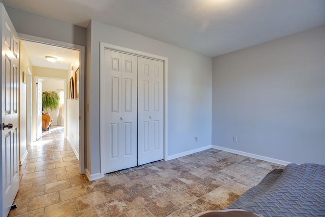 unfurnished bedroom with a closet