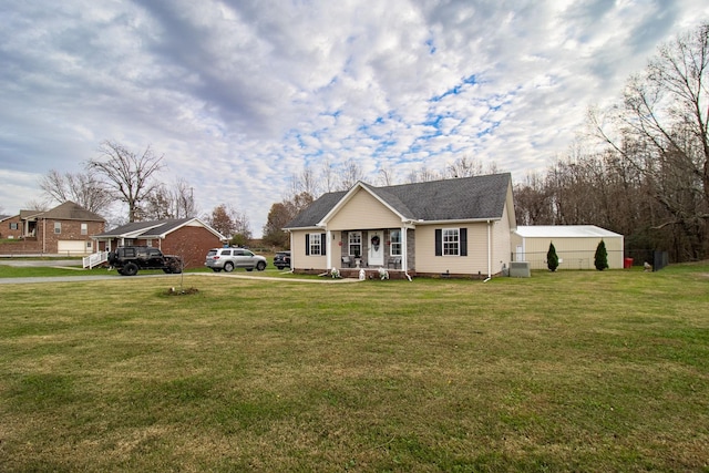 view of front of property with central AC unit, a porch, and a front yard