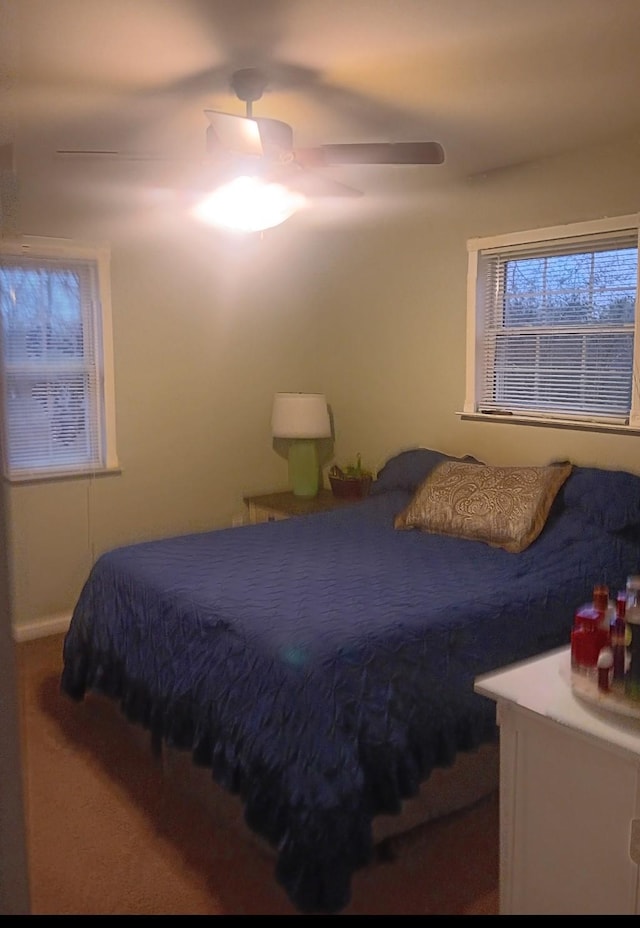 bedroom featuring carpet and ceiling fan