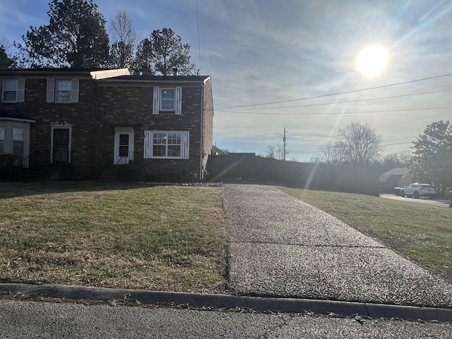 view of front of property with a front lawn