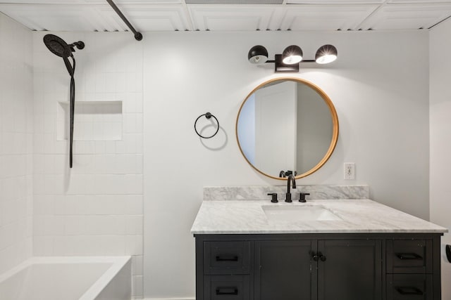 bathroom with bathing tub / shower combination and vanity