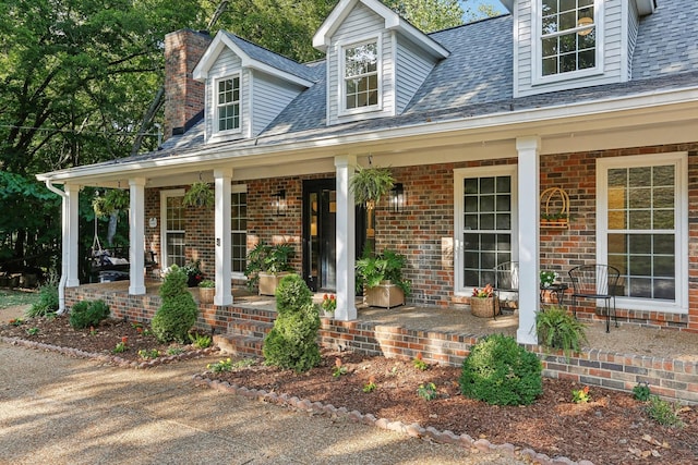 property entrance featuring covered porch