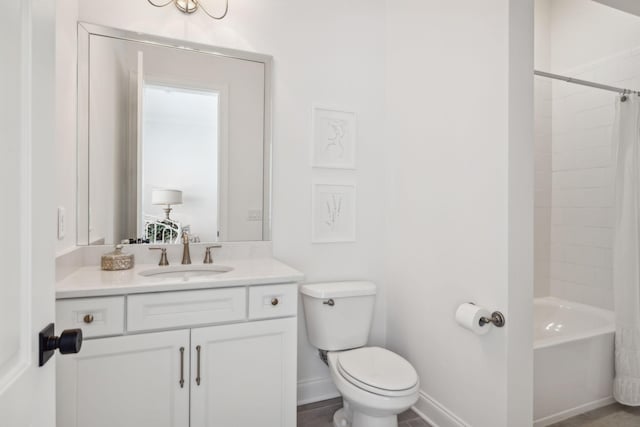 full bathroom featuring vanity, shower / tub combo, and toilet