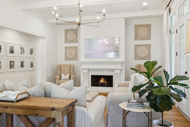 living room featuring hardwood / wood-style floors and beamed ceiling