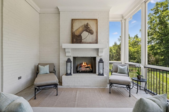 sunroom with an outdoor brick fireplace